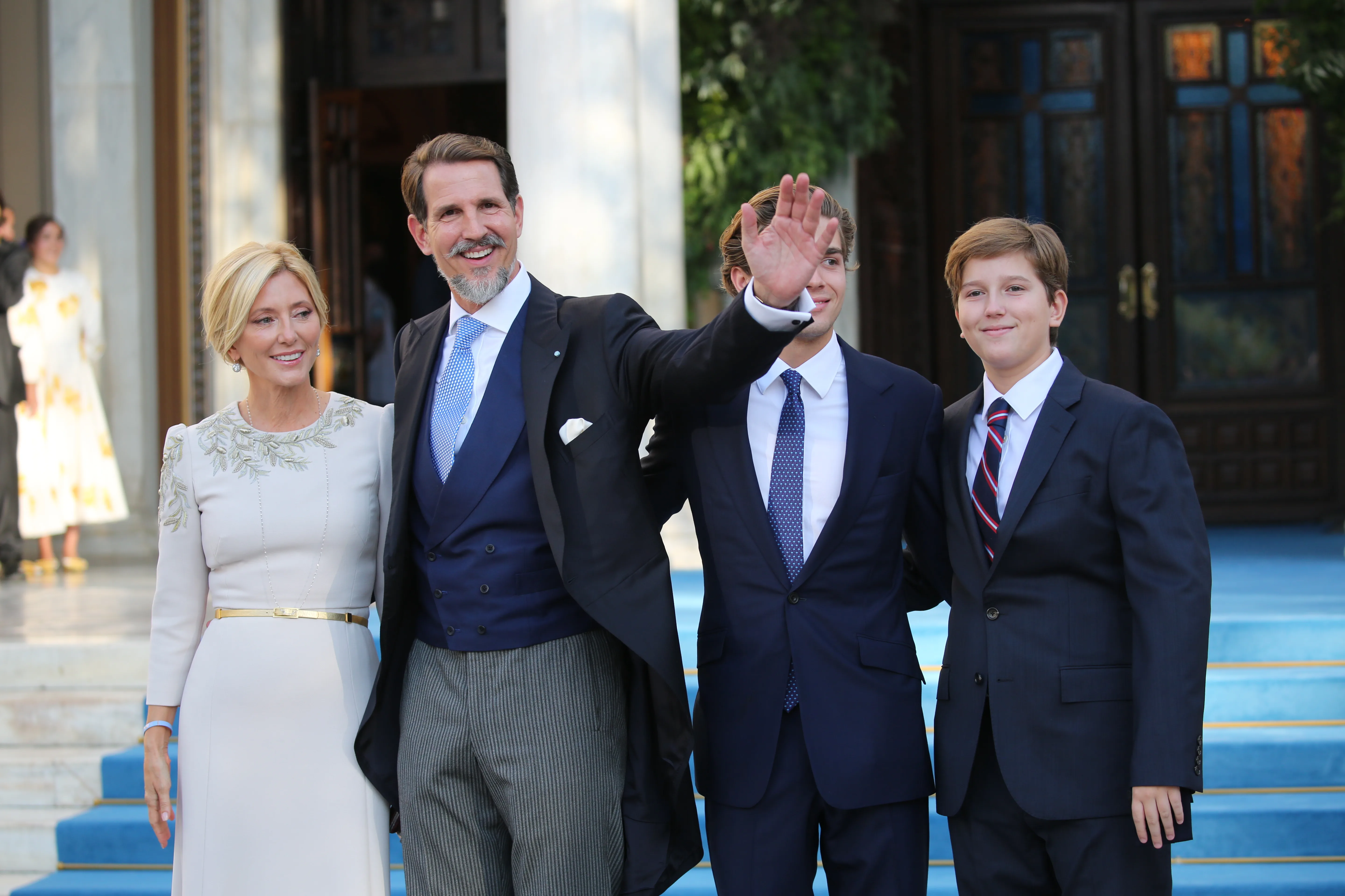 The prince of Greece, his wife and two of his sons. 