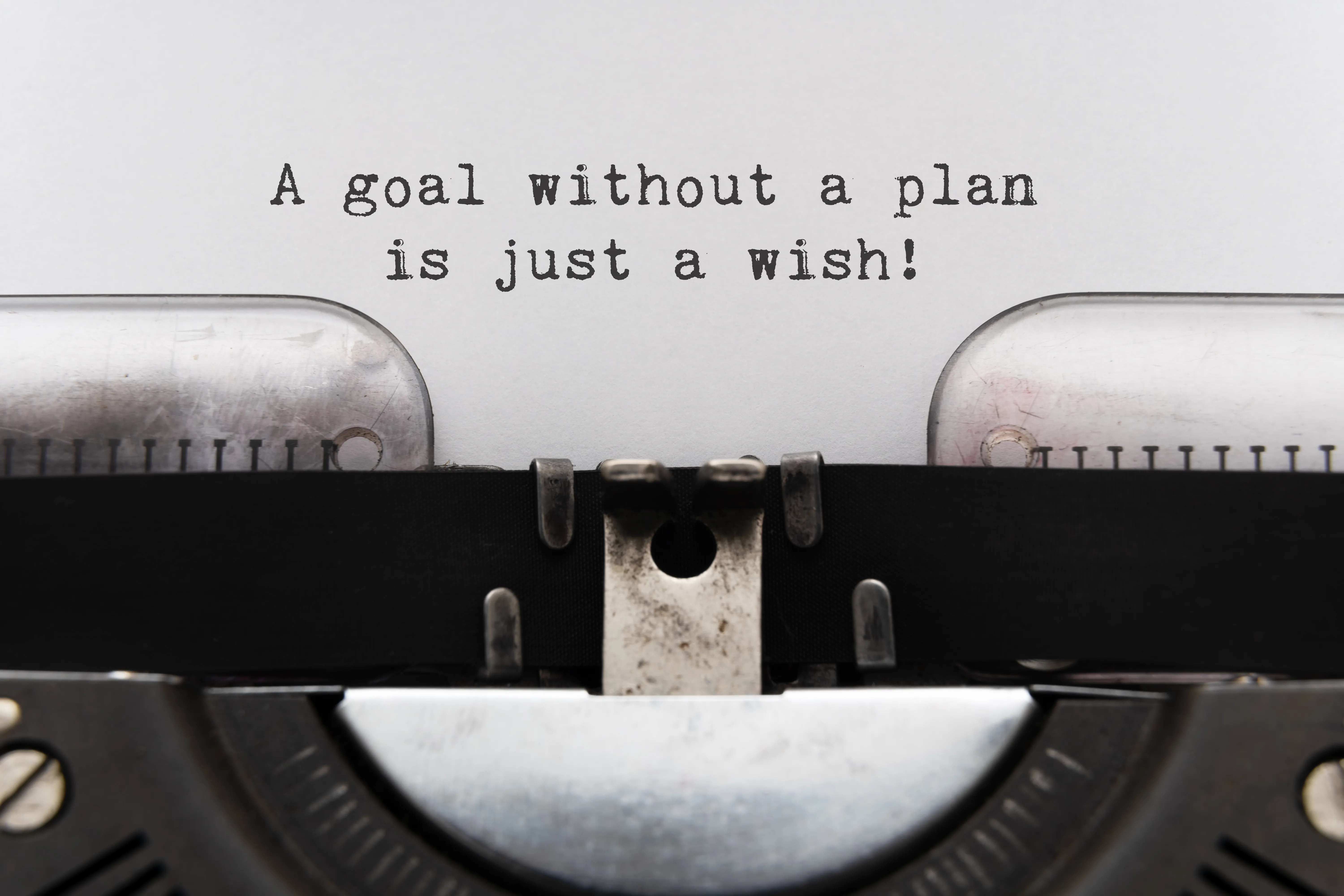 Motivational text being written on a typewriter