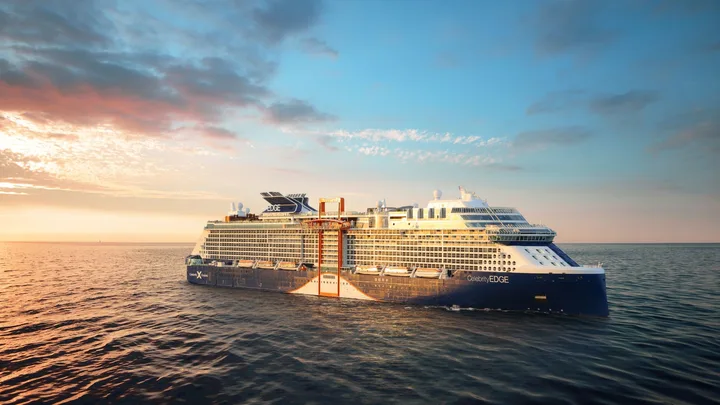 Celebrity Edge at sea at sunset