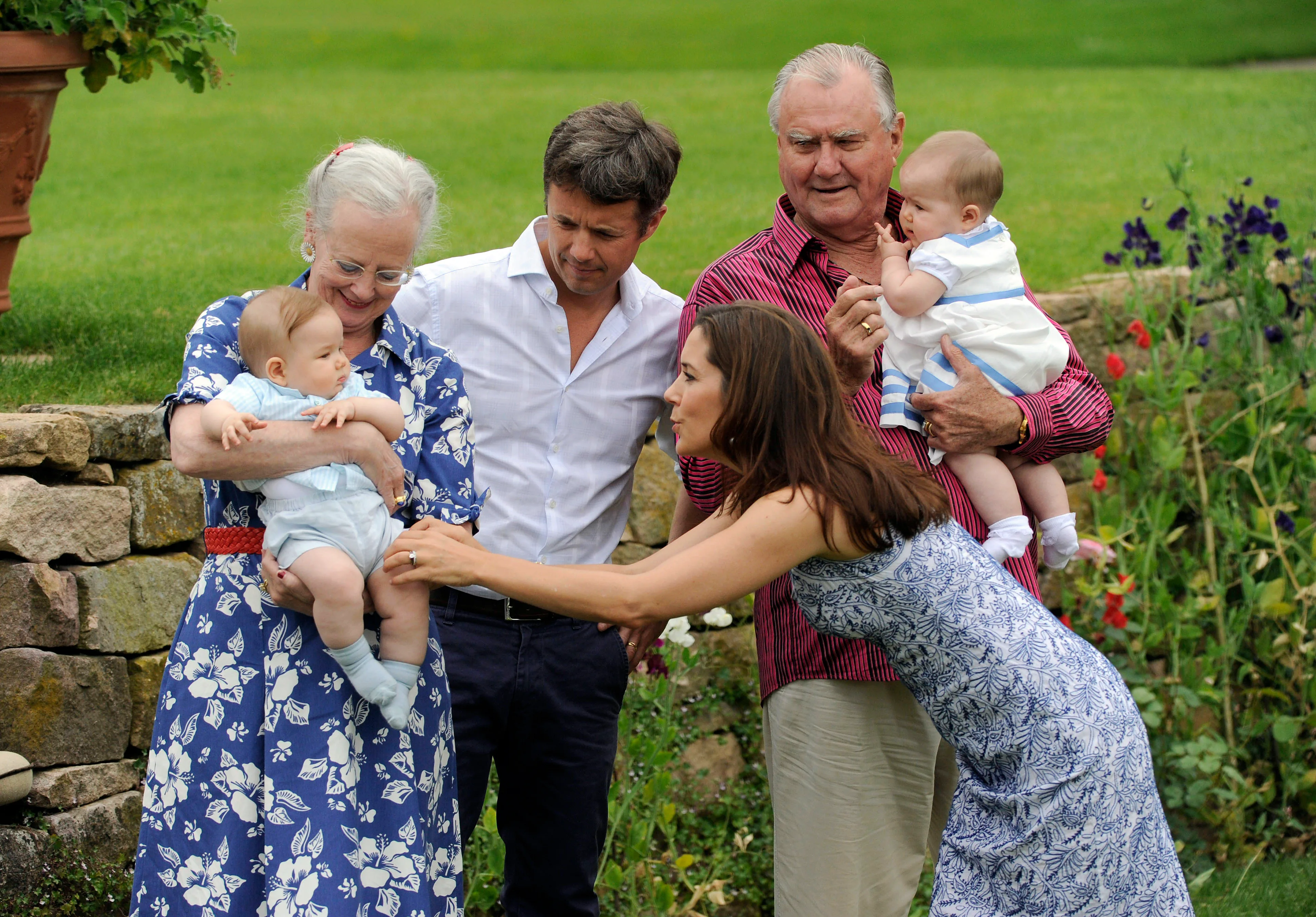 Queen Margrethe, Princes Consort Henrik, Crown Prince Frederik and Crown Princess Mary and in the garden of Grasten Castle