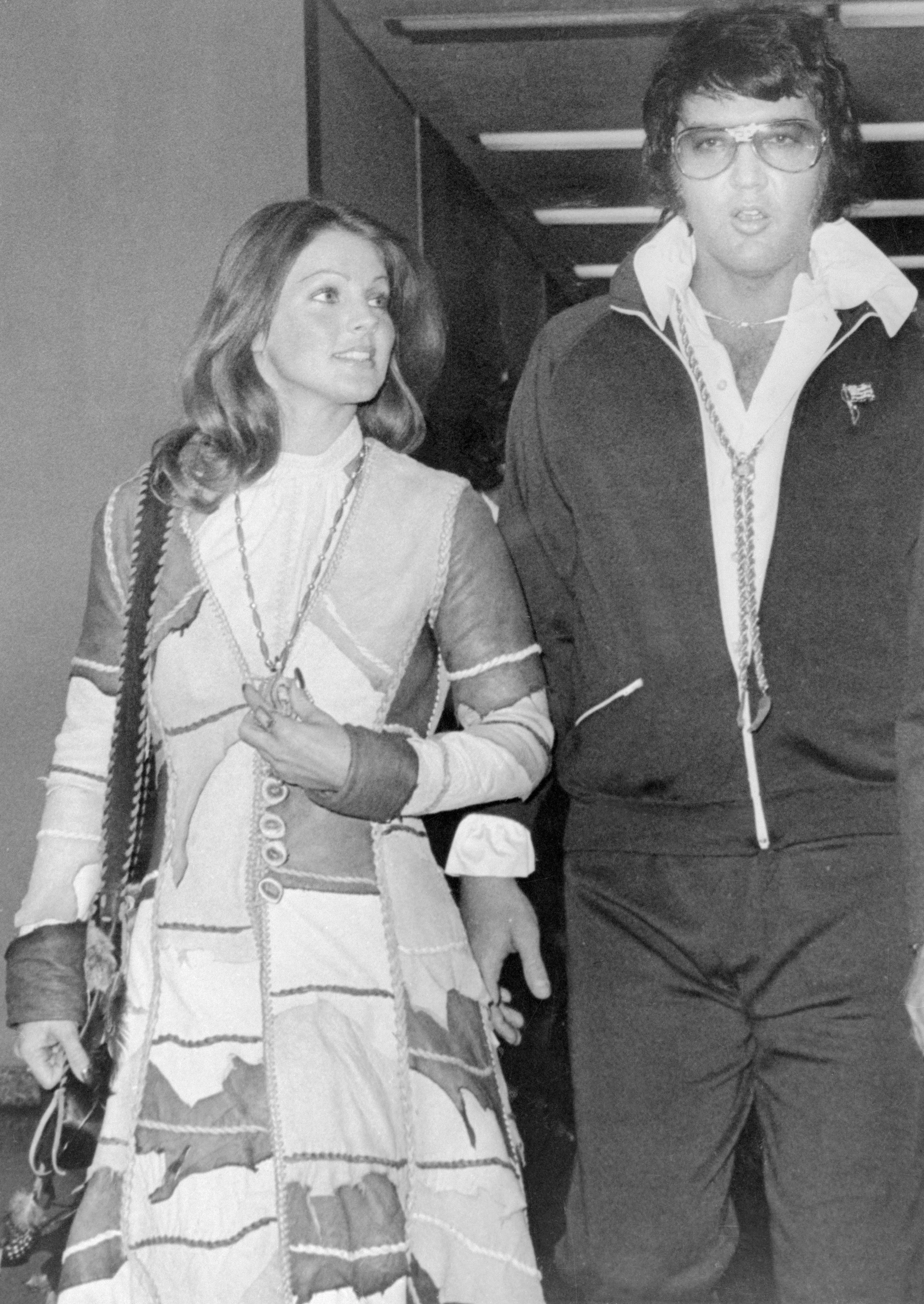  Entertainer Elvis Presley leaves Santa Monica California Superior Court after being granted a divorce from his wife Priscilla. The couple had been married six years and in spite of the October 9 divorce proceedings, they appeared very amicable as they left the courtroom. Source: Getty Images