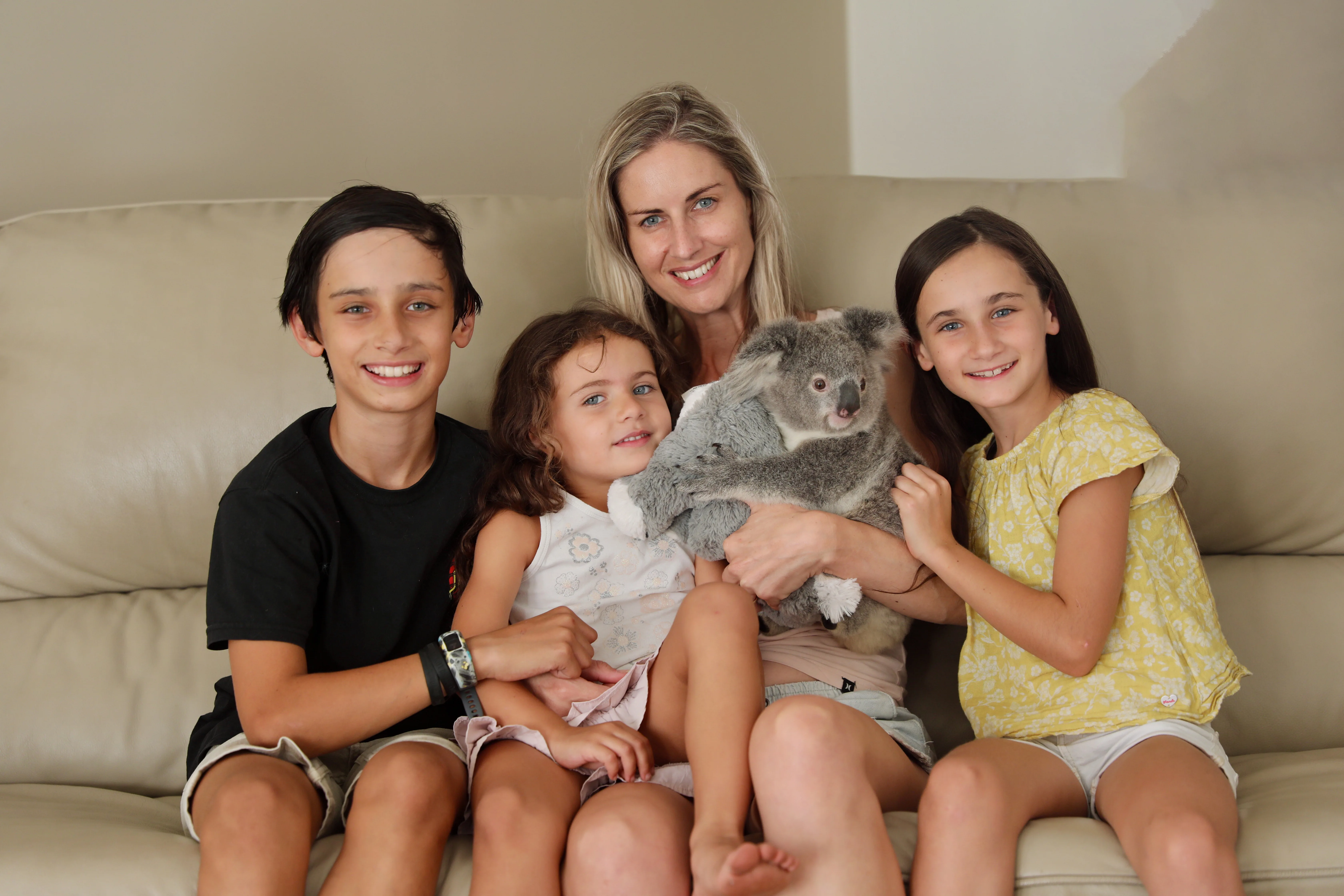 Hayley and her family with a former koala joey Elsa