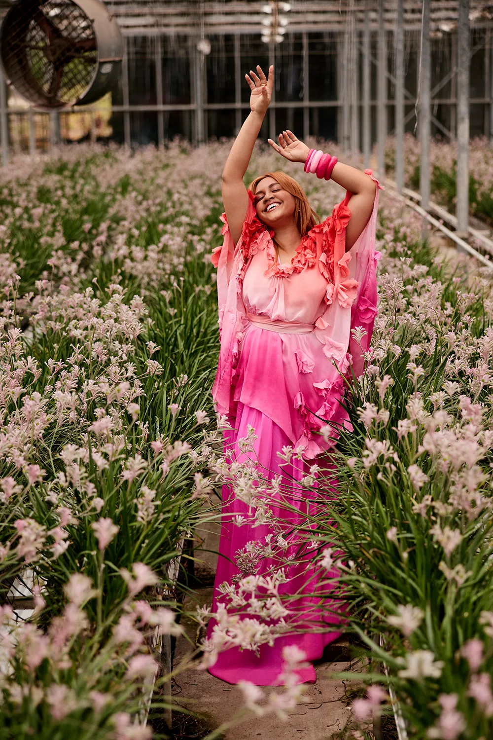 Jessica Mauboy in field of flowers