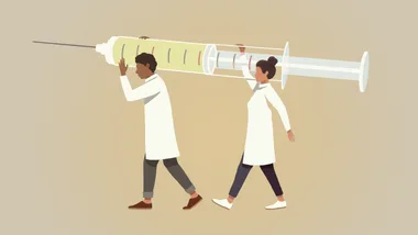 Two scientists in lab coats carry an oversized syringe, symbolizing collaboration in research and healthcare.