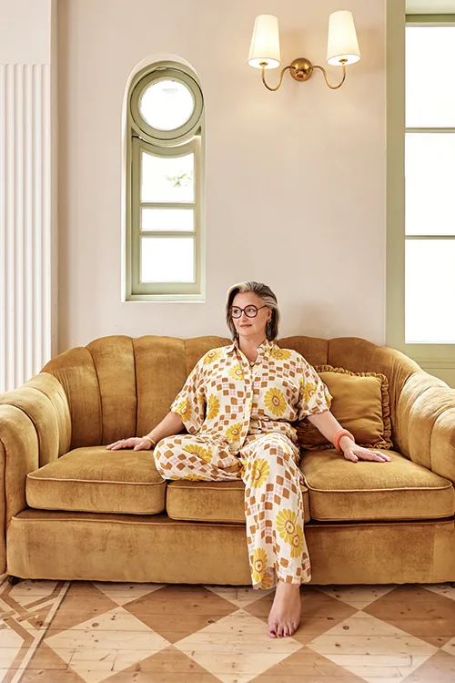 Julie Goodwin sitting on a couch