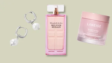 Silver earrings, Elizabeth Arden Red Door Revealed perfume, Laneige sleeping mask on beige background.