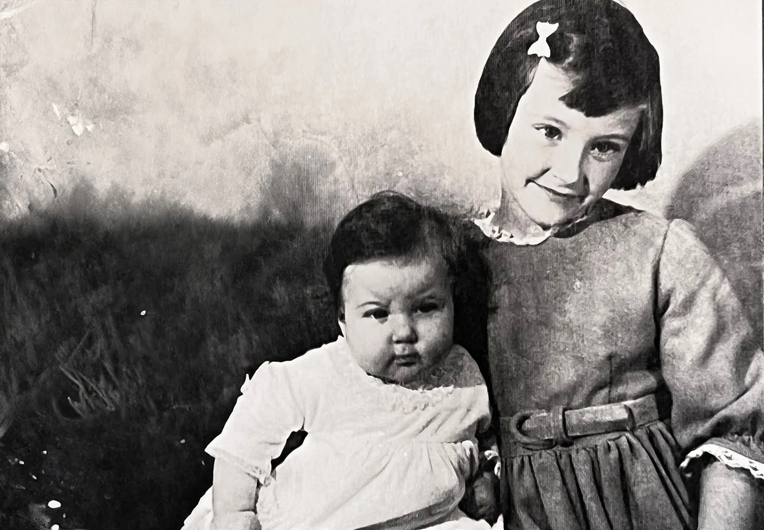 A young Julie Forster and sister Elizabeth, who were religiously covered in Johnson & Johnson baby powder after a bath as a child.