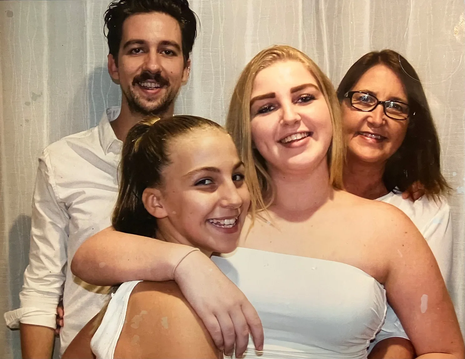 Elizabeth (right) with her children Josh, Laura and Ellie.