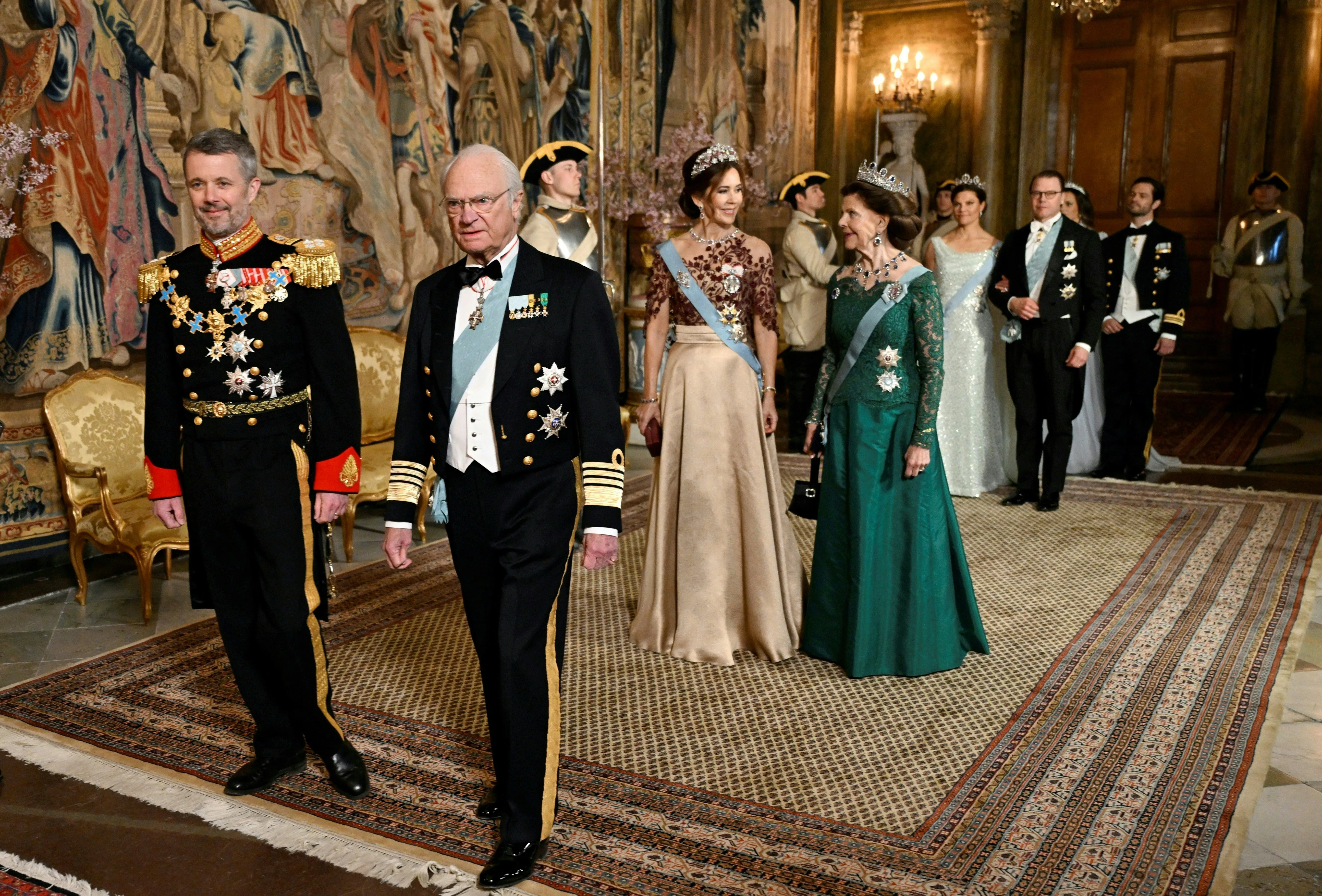 (LtoR) King Frederik X of Denmark, King Carl XVI Gustaf of Sweden, Queen Mary of Denmark and Queen Silvia of Sweden arrive for a banquet at Stockholm Palace in Stockholm, Sweden on May 6, 2024, to celebrate the Danish royal couple's two-day state visit to the country. (Photo by Pontus LUNDAHL / Ritzau Scanpix / AFP) / Denmark OUT (Photo by PONTUS LUNDAHL/Ritzau Scanpix/AFP via Getty Images)