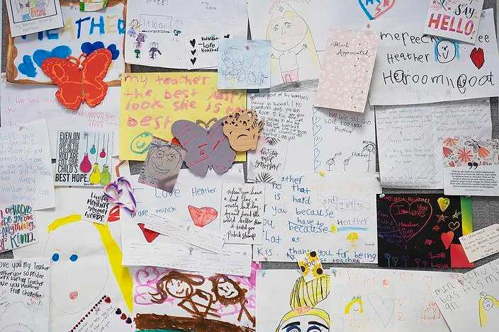 Notes and drawings from students in an office. 