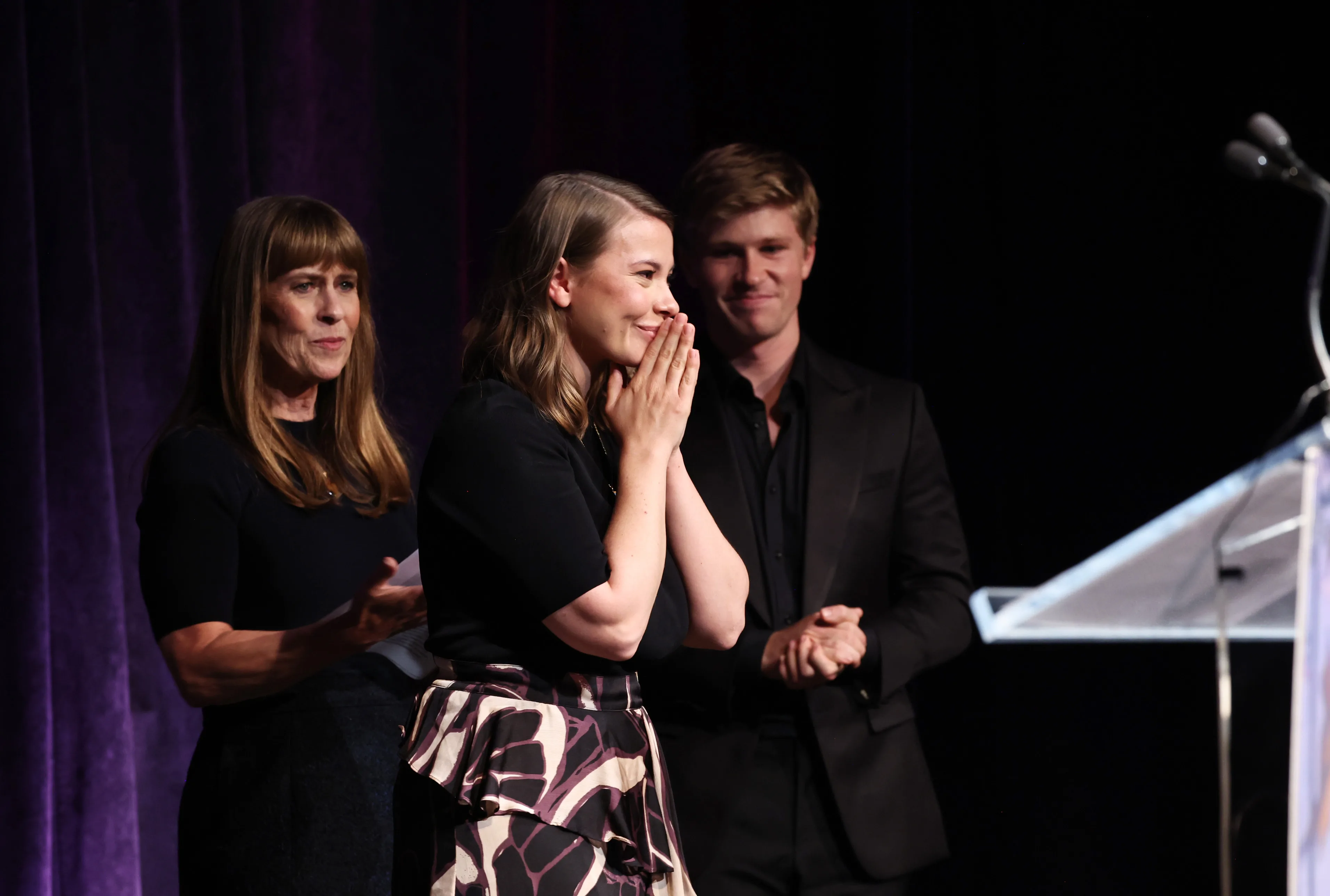 Terri Irwin, Blossom Award Honouree Bindi Irwin, and Robert Irwin speak onstage during the Endometriosis Foundation Of America's 12th Annual Blossom Ball in New York City 2024.