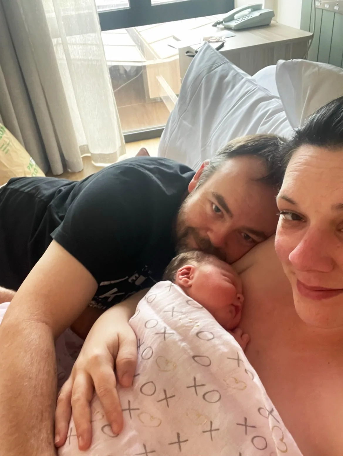 Newborn Layla with her parents Katrina and Steve. 