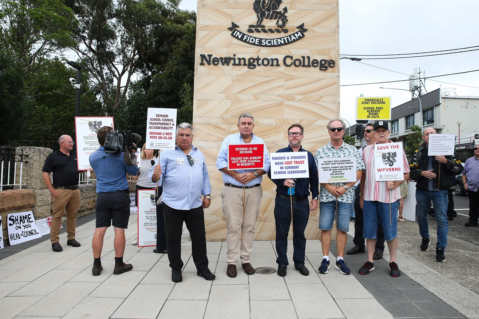 Protesters outside Newington College, unhappy about the co-education announcement.