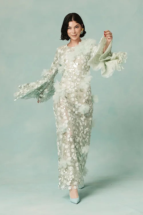 Azizi Donnelly wearing long gown in photo shoot by Peter Brew-Bevan