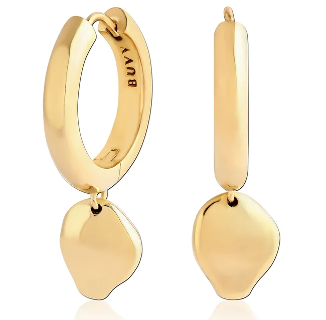 Gold hoop earrings with petal-shaped charms and "BUVY" engraved on the inner side.