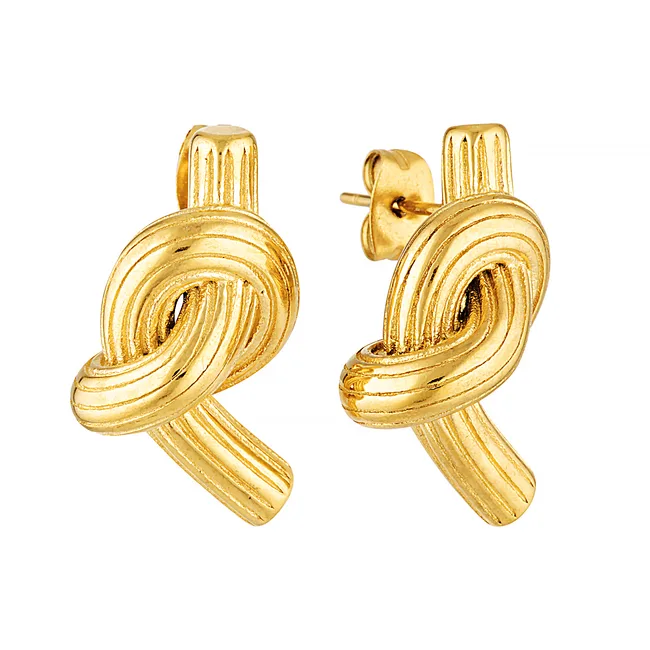 Gold knot earrings with textured finish on a white background.
