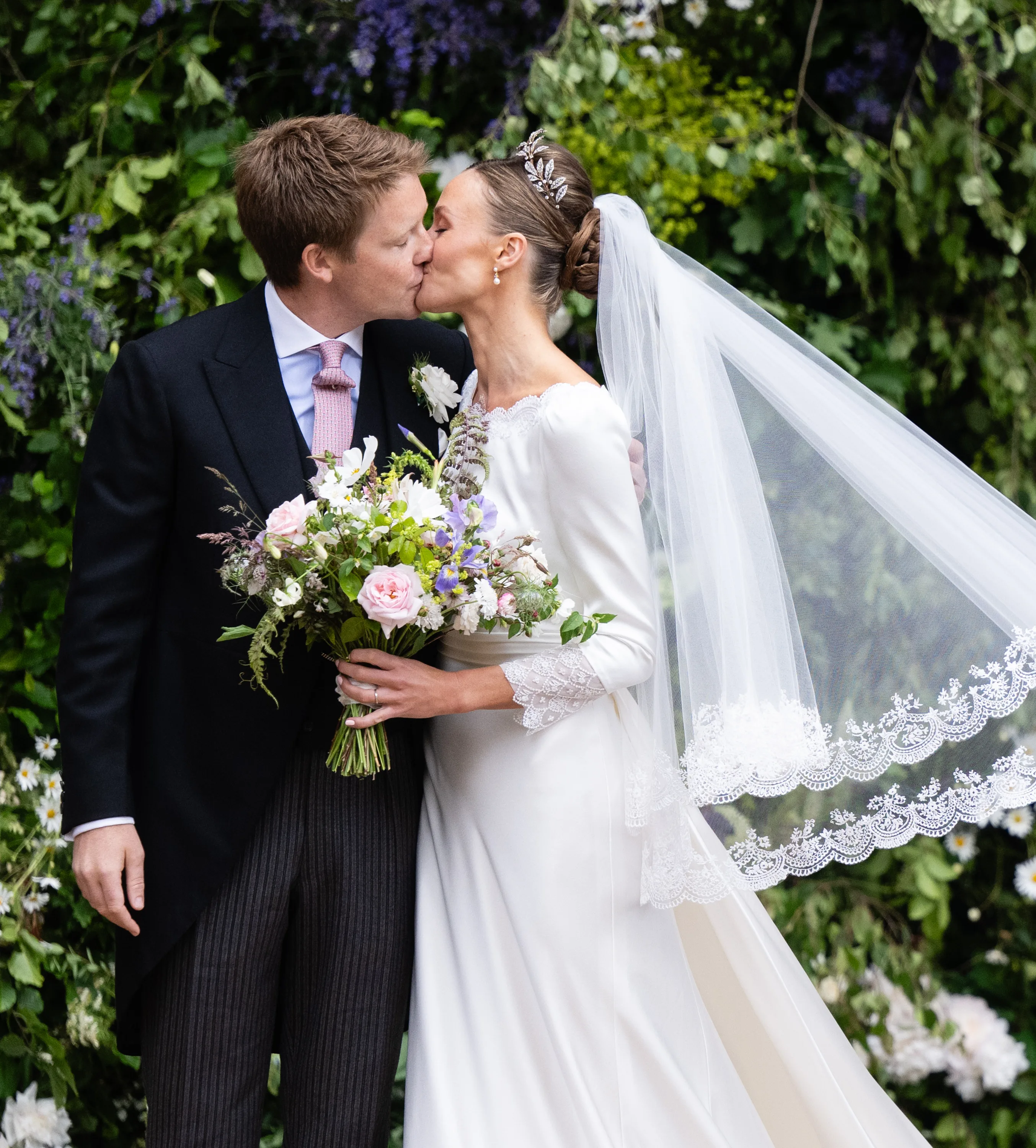 CHESTER, ENGLAND - JUNE 07: Hugh Grosvenor, Duke of Westminster and Olivia Grosvenor, Duchess of Westminster kiss after their wedding ceremony at Chester Cathedral on June 07, 2024 in Chester, England. (Photo by Samir Hussein/WireImage)