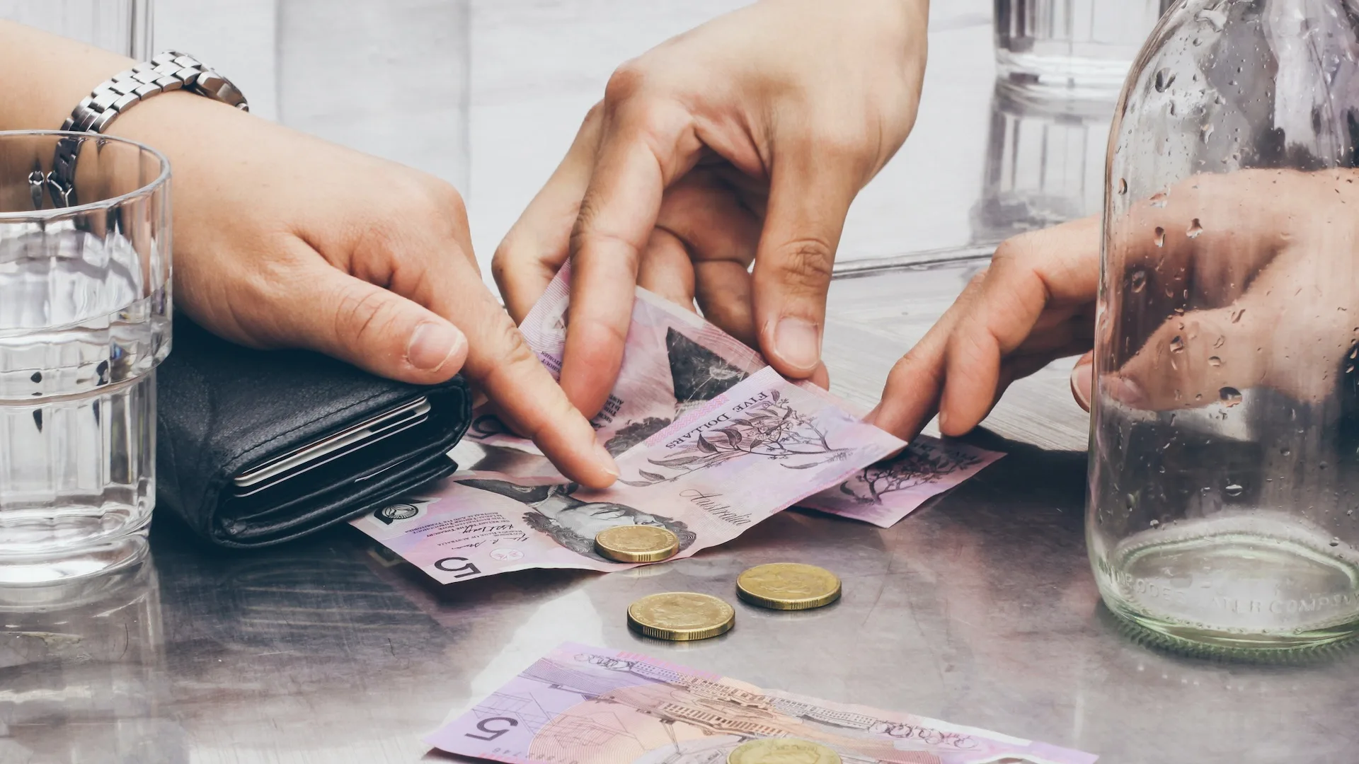 You can still pay with cash at many businesses in Australia.