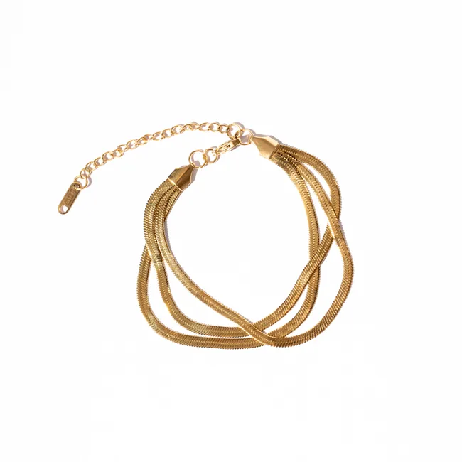 Gold snake chain bracelet with adjustable clasp on white background.