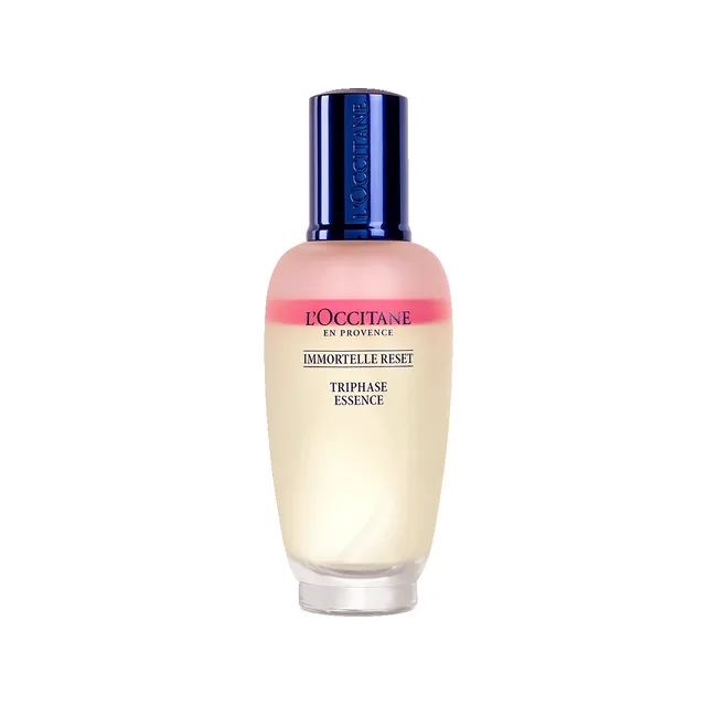 L'Occitane Immortelle Reset Triphase Essence bottle with blue cap on a white background.