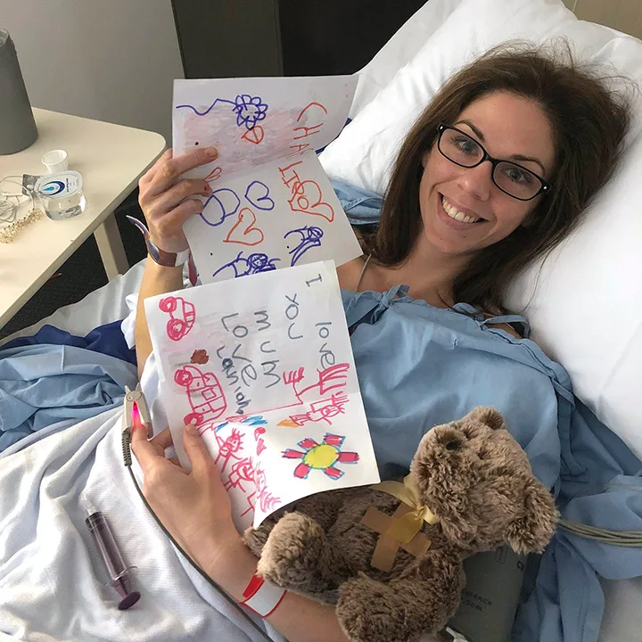Jen O'Neill in hospital after experiencing medical gaslighting. 