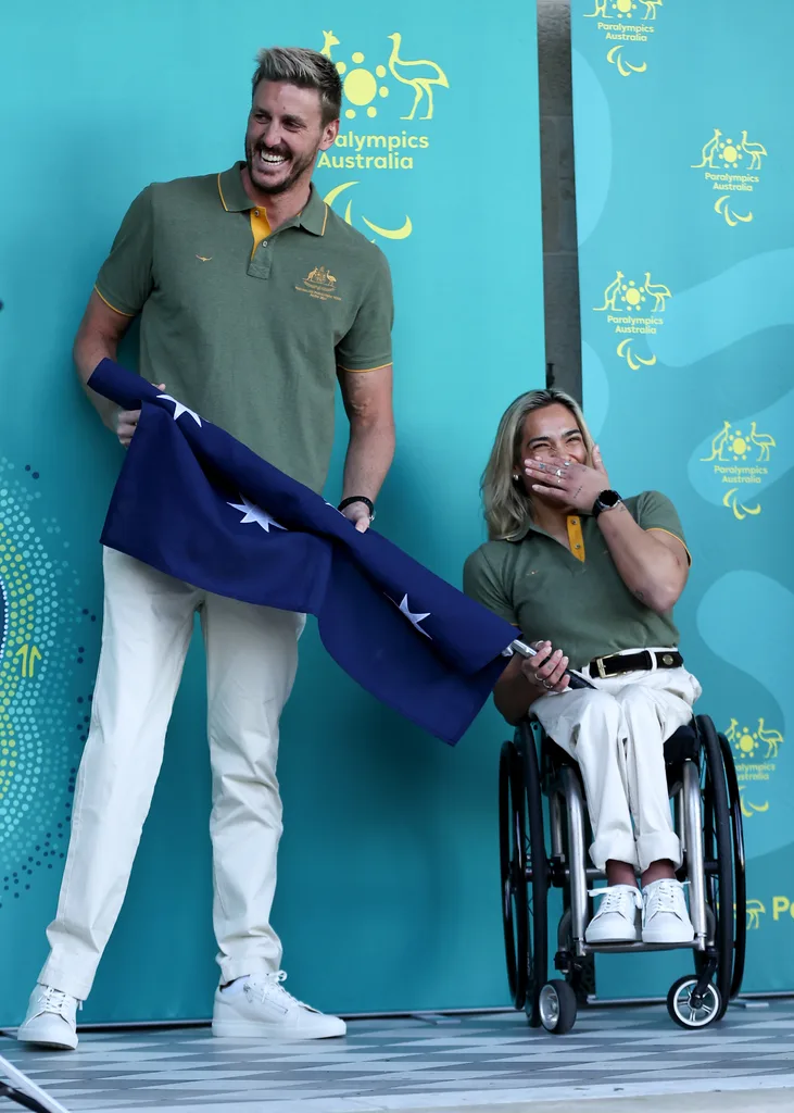 the australian paralympic flag bearers
madison and brenden