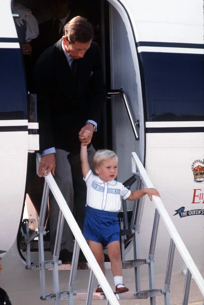 the royal travel rule - the then-Prince Charles and a very young Prince William disembarking from a flight