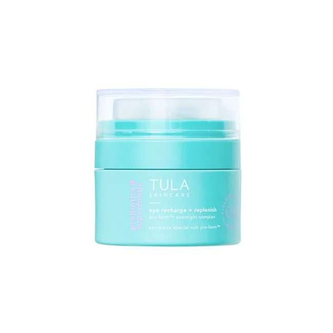 TULA Skincare Eye Recharge + Replenish cream in a light blue container with white text and clear lid.