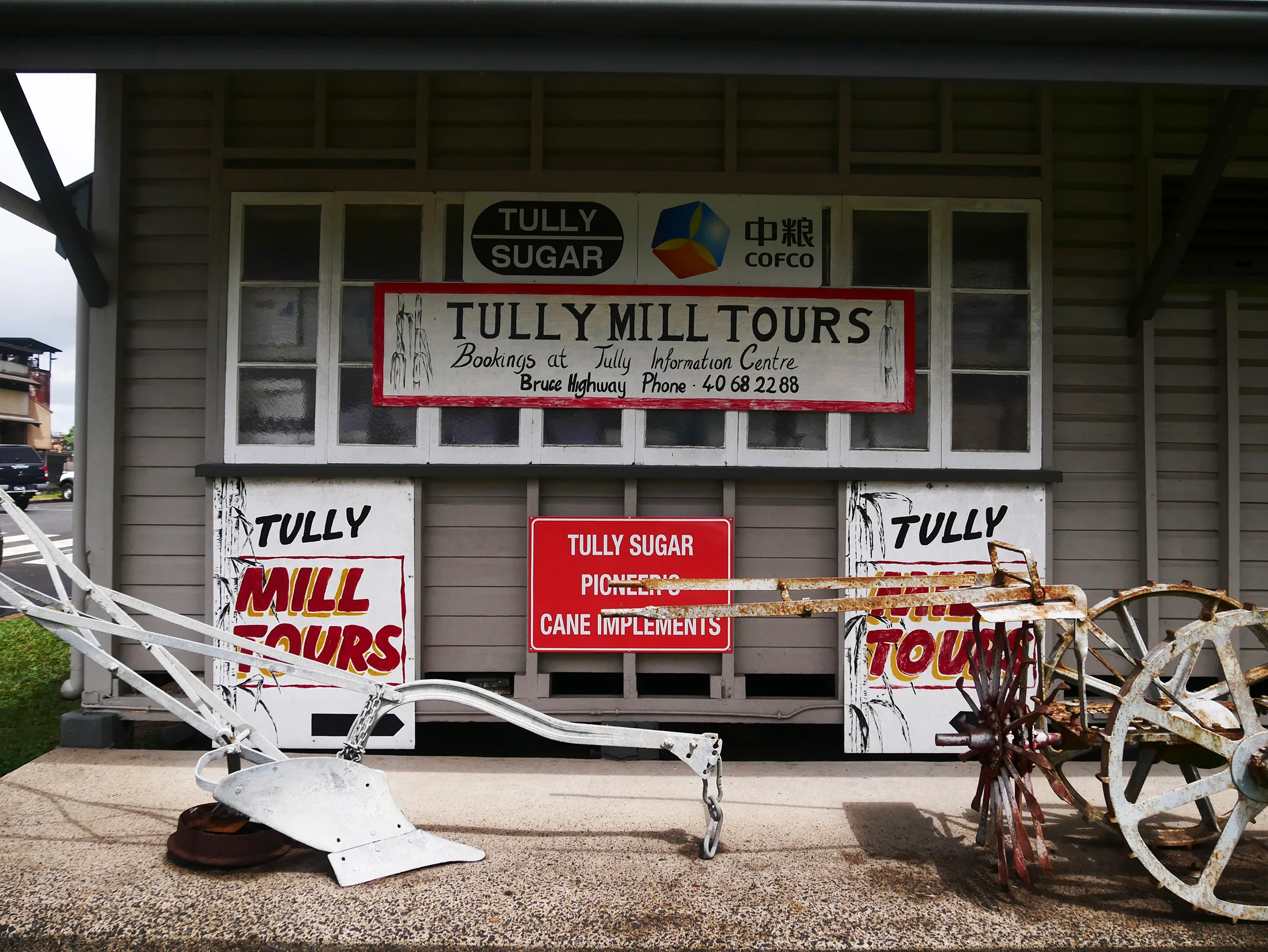 Photo of a storefront in Tully with old fashioned signage.