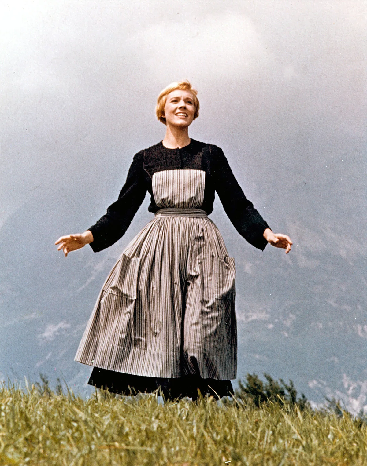 Maria (Julie Andrews) from the opening sequence of The Sound of Music - singing on a mountain