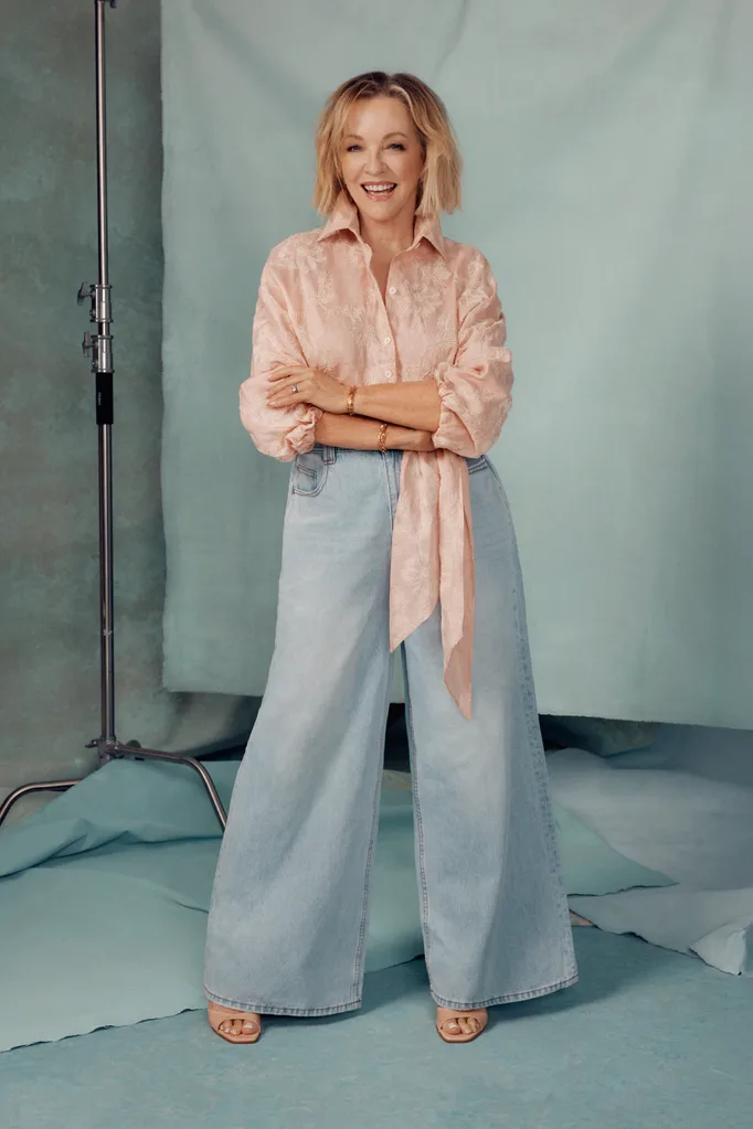 Rebecca Gibney wearing Scanlan Theodore shirt and Aje jeans. Zara shoes.