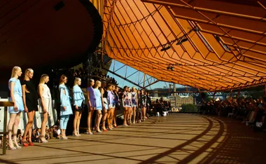 A line of fashion models inside the Sydney Opera House