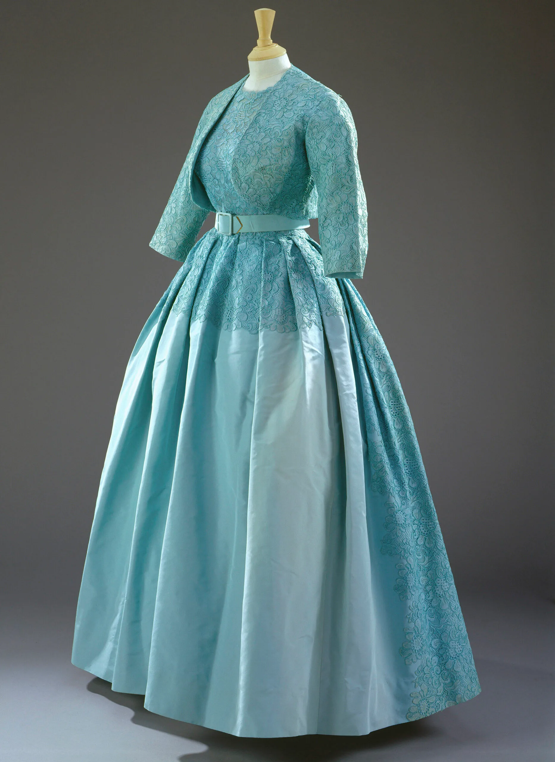 Blue gown with matching jacket on a mannequin