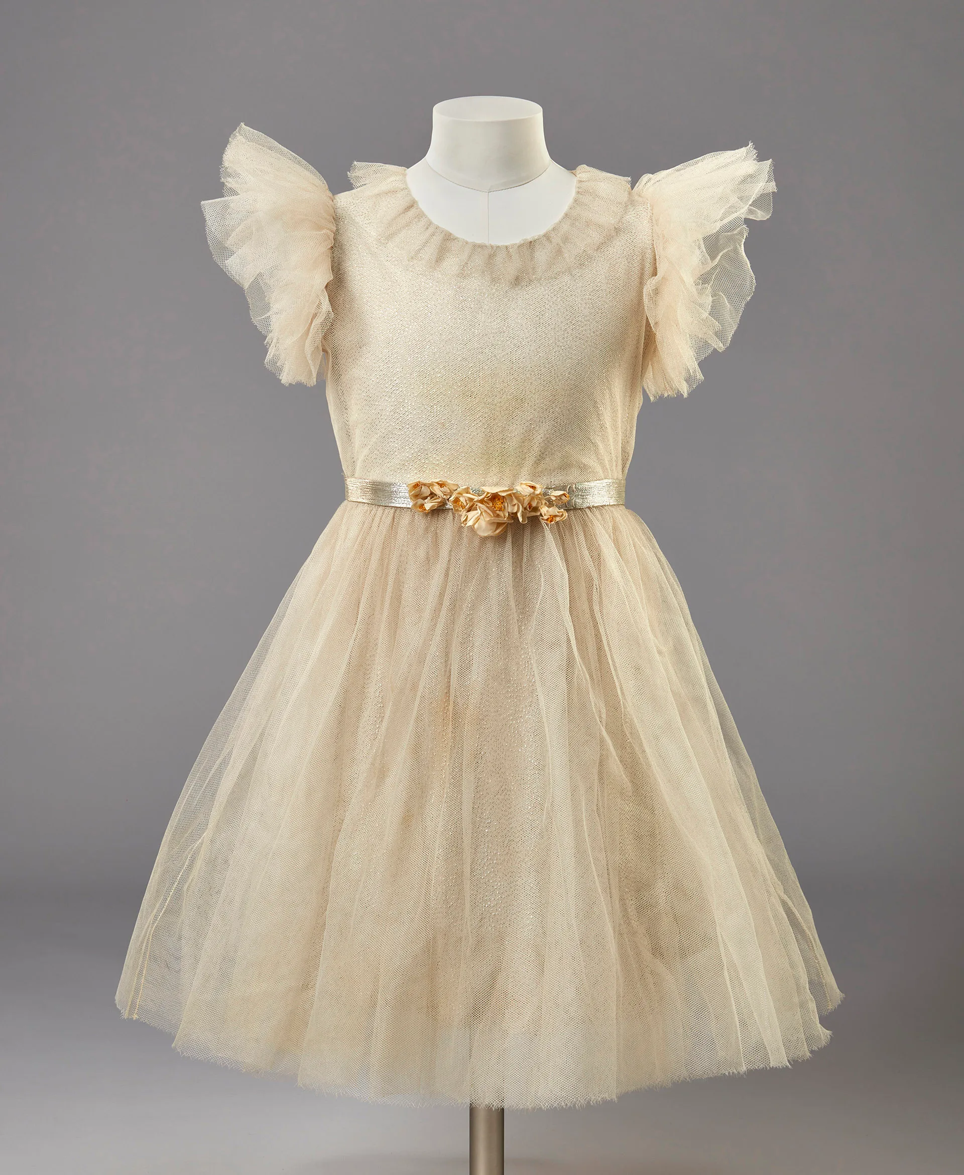 Queen Elizabeth II's childhood yellow dress with tulle and a belt