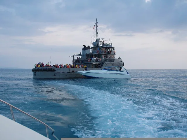 Navy Frigate approaching dive boat