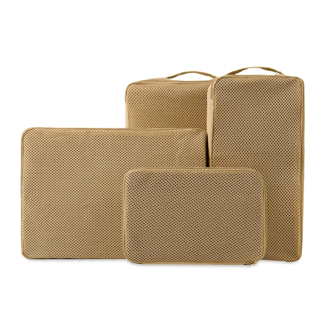 Four beige mesh packing cubes in varying sizes on a white background.