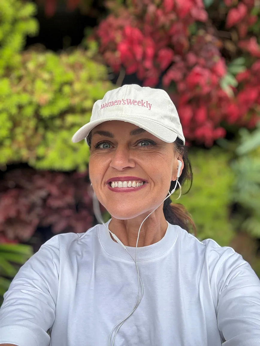 Chrissie Swan wearing a Walk with The Weekly hat.