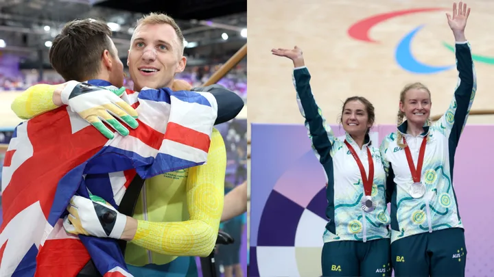 Athletes celebrating at Paris 2024 Paralympic event, one wrapped in UK's flag, others with medals, smiling and waving.