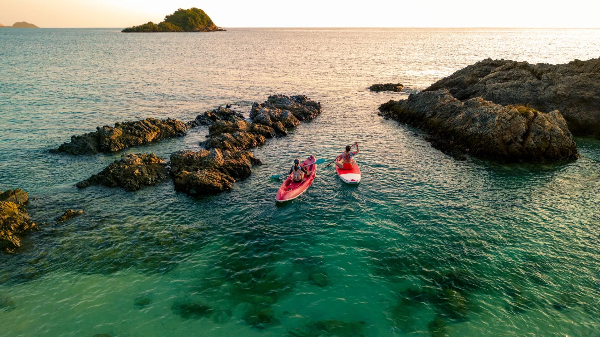 Two women enjoy the water aqua sport on the seaside