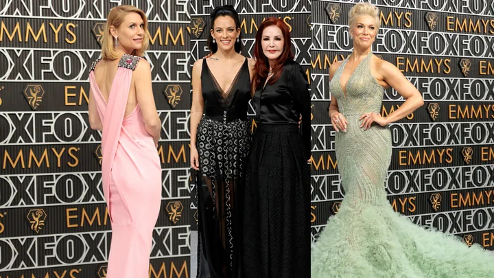 Four women in elegant gowns pose at the Fox Emmys event.