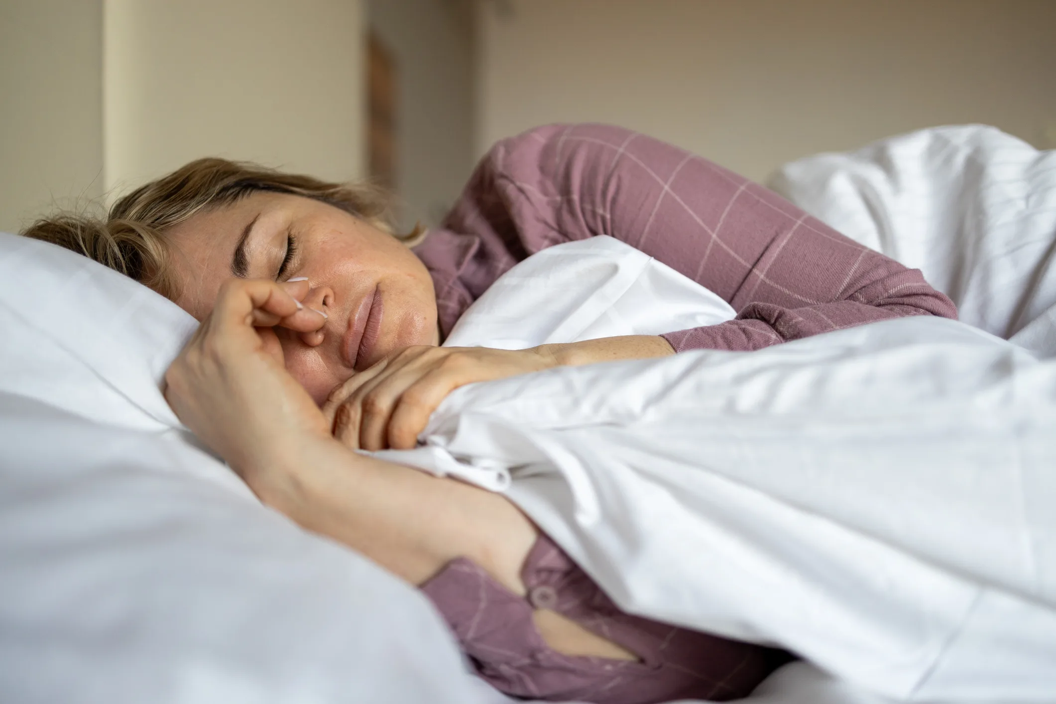 Woman sleeping in bed