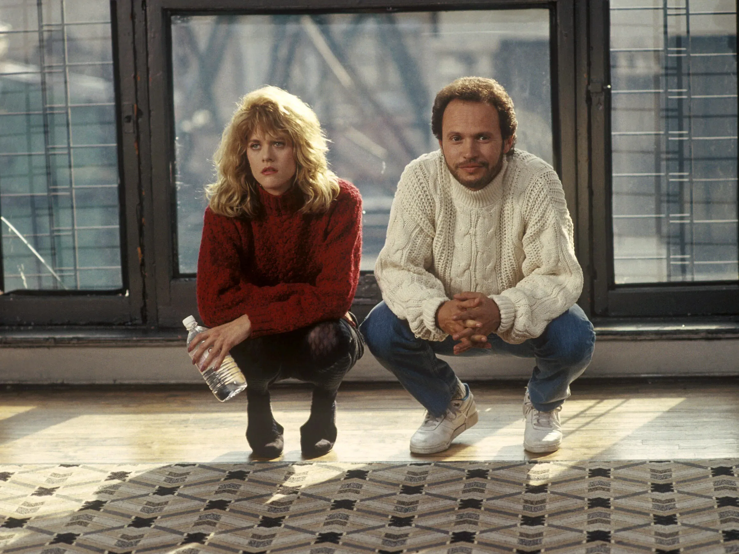 a still from when harry met sally, meg ryan and billy crystal.