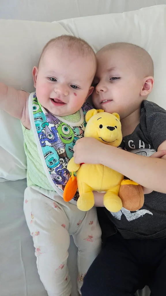Tommy and his baby sister Aria who was a stem cell transplant donor.