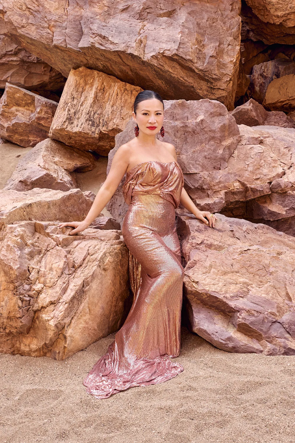 Poh Ling Yeow in a pink sparkly gown on AWW Christmas shoot photoshoot in the Northern Territory. 