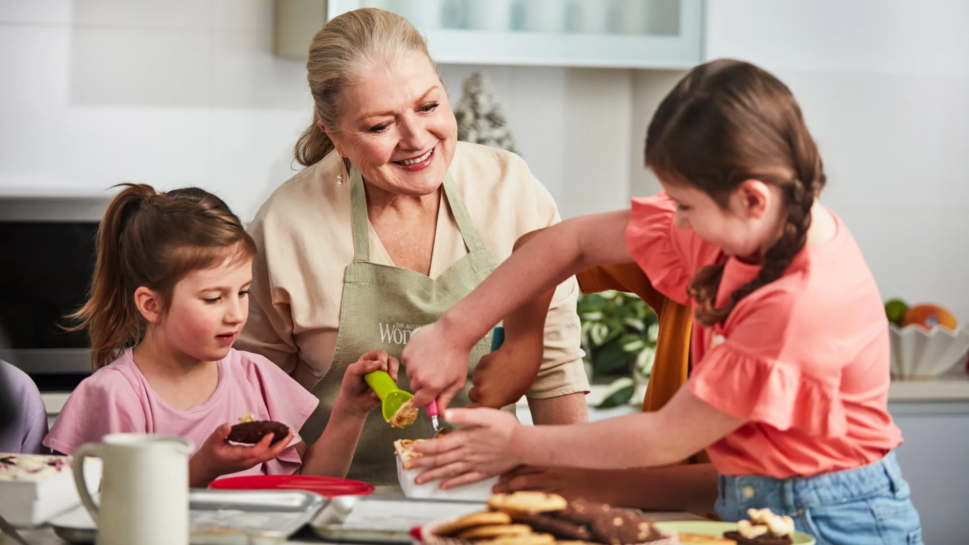 Fran Abdallaoui with her small helpers in the test kitchen