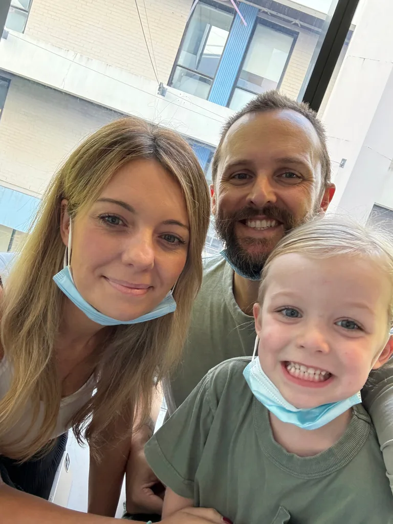 Ashley and Luke with their son, Heath who is undergoing cystic fibrosis treatment.