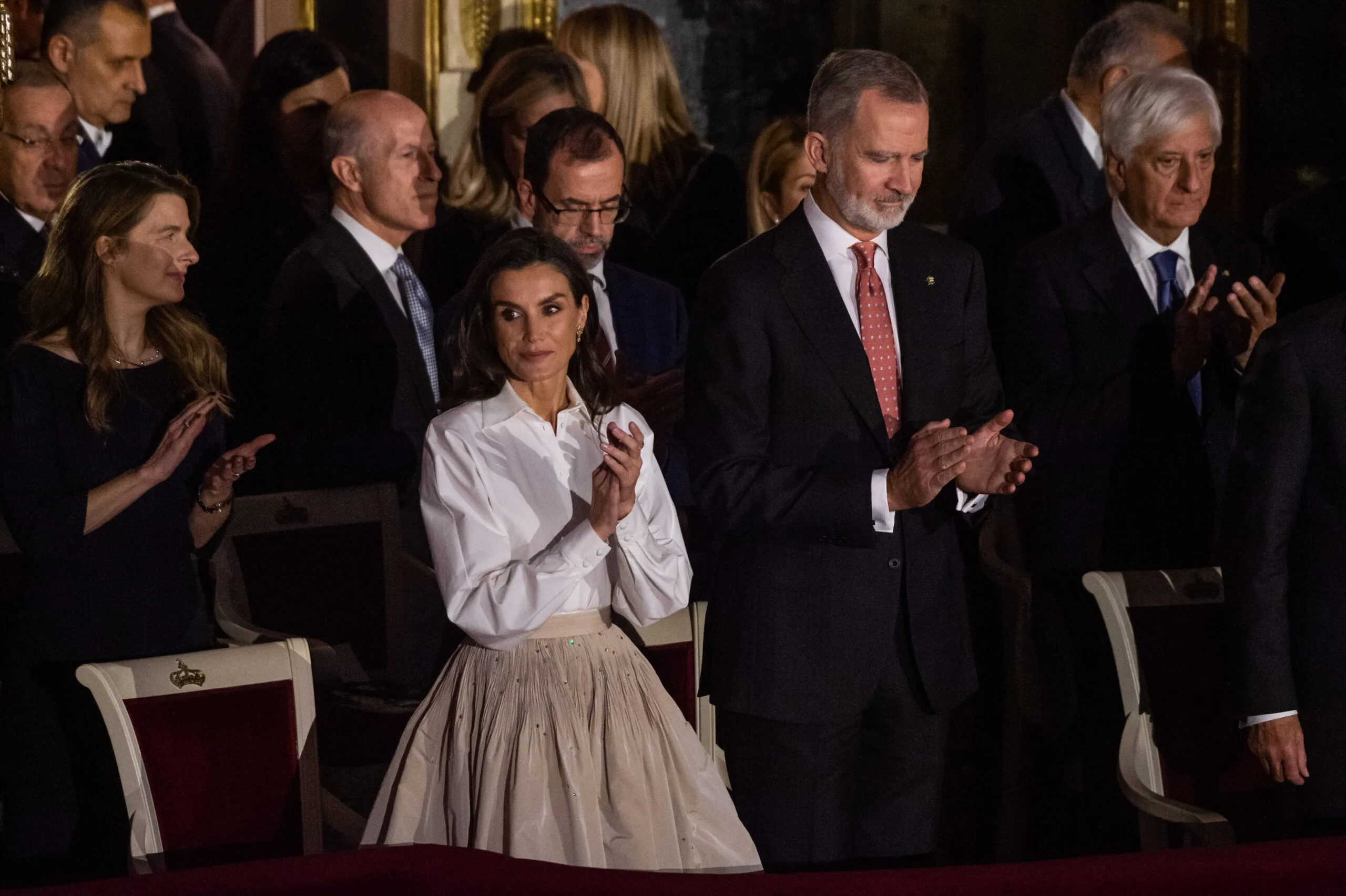 Queen Letizia smiles proudly as King Felipe is awarded an Honorary Degree in Social Sciences and Statistics by the the Federico II University of Naples.