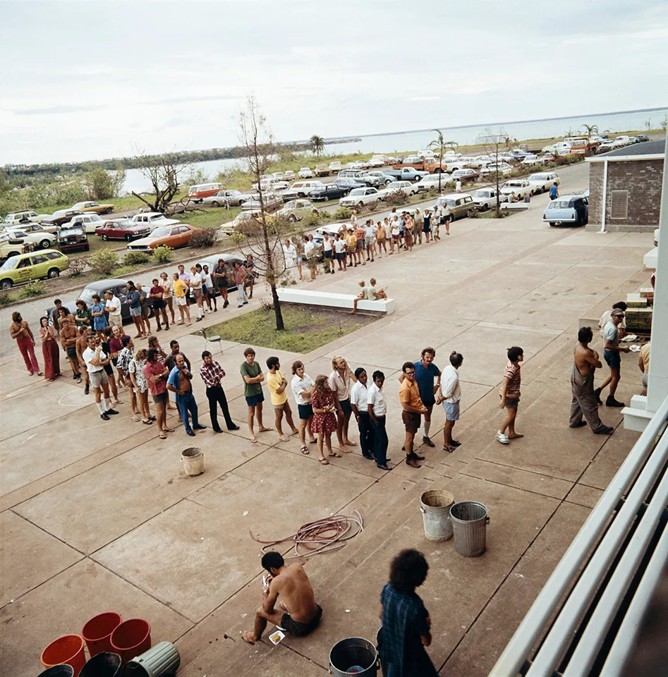 Queue of people outside a building in Darwin.