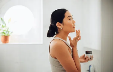 A woman trying new skincare.