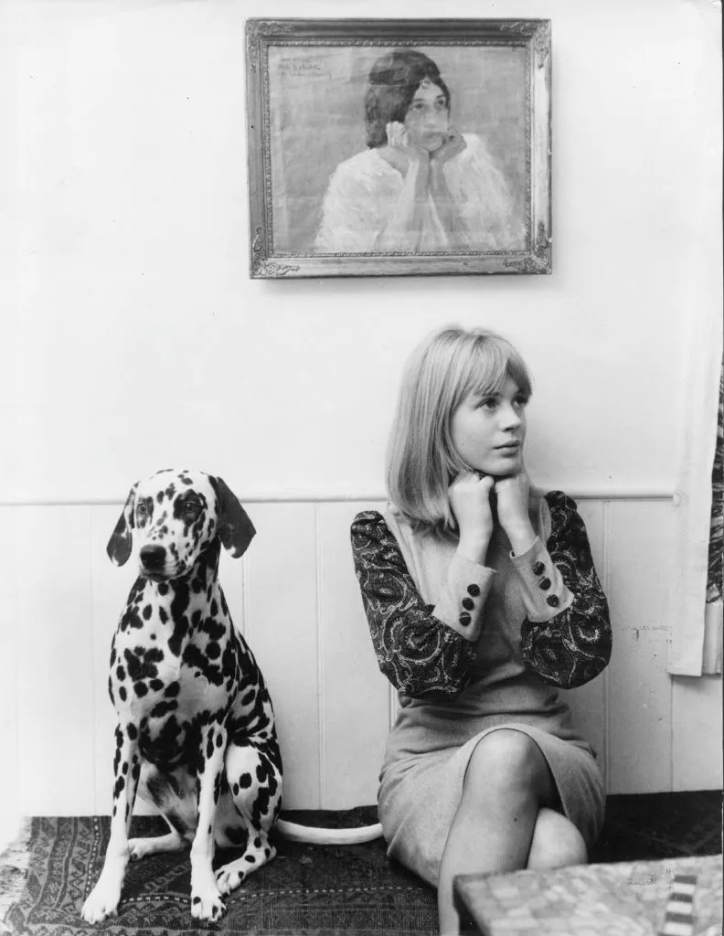 Marianne Faithfull and her dog.